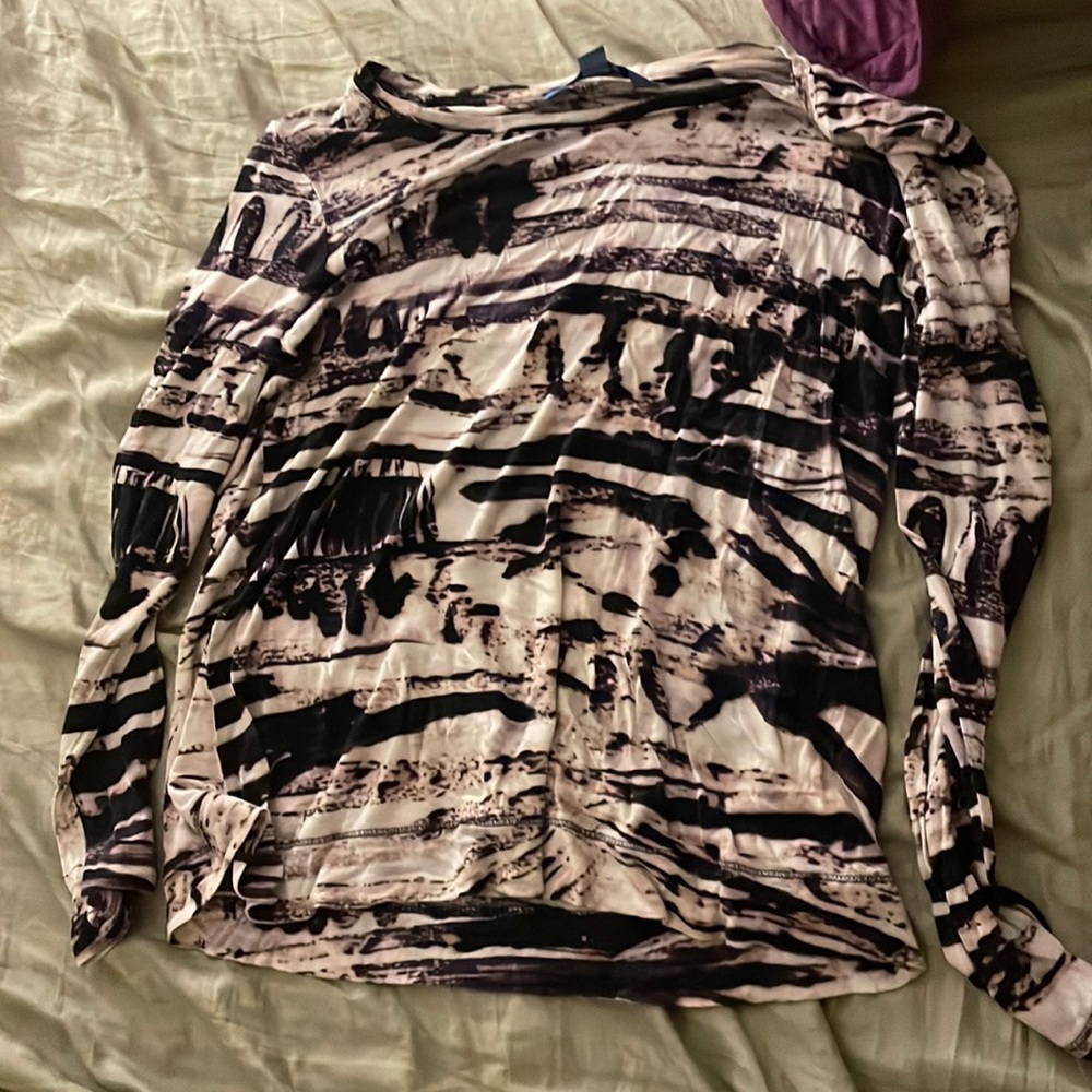 Brown,tan, and a a hint of purple when it’s in light